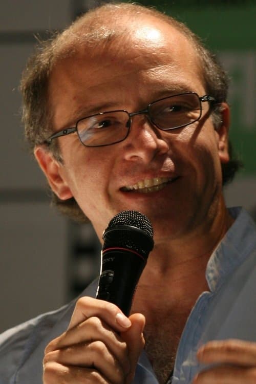 A portrait of Juan Carlos Rulfo