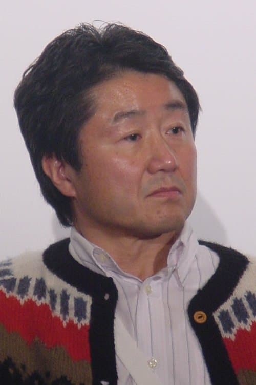 A portrait of Junichi Suzuki