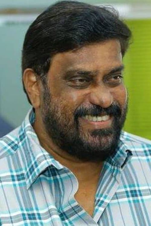 A portrait of K. Madhu