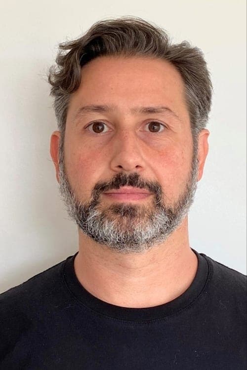A portrait of Kasra Farahani