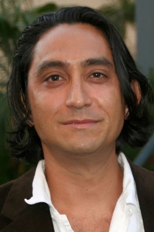 A portrait of Keoni Waxman