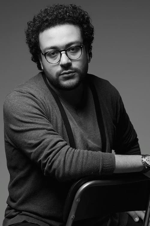 A portrait of Khaled Mansour