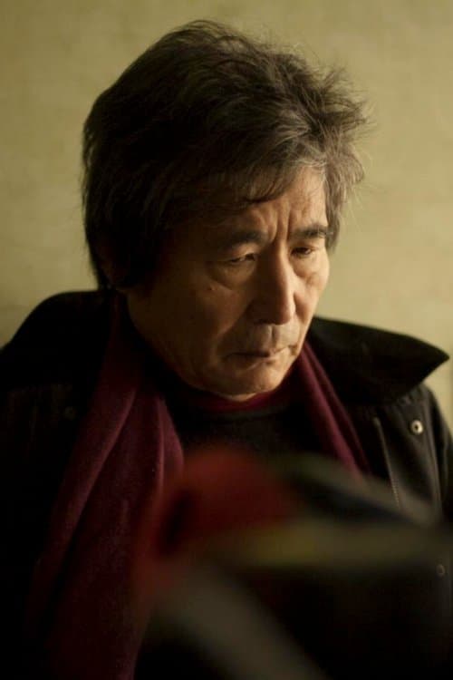 A portrait of Kōhei Oguri