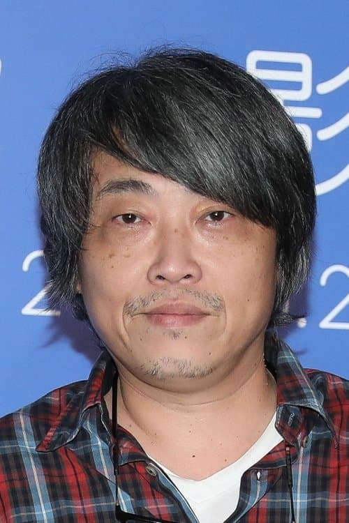 A portrait of Kuoan Lai
