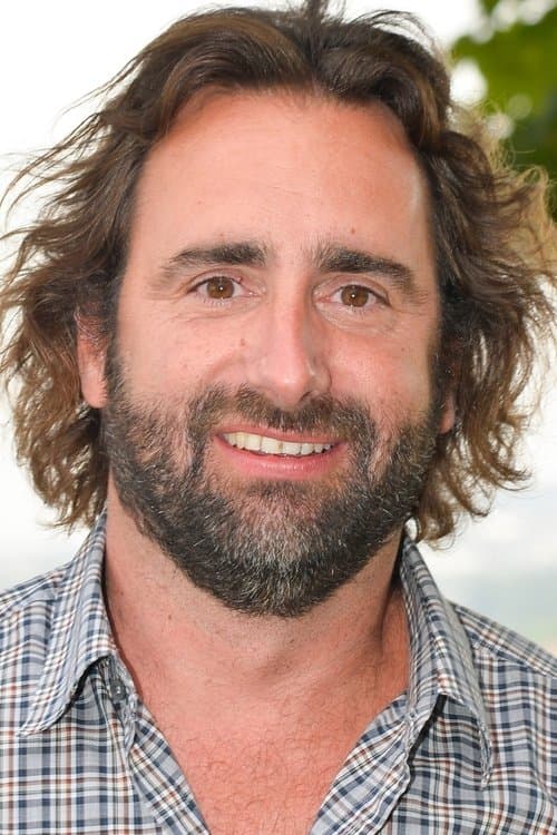 A portrait of Ludovic Colbeau-Justin