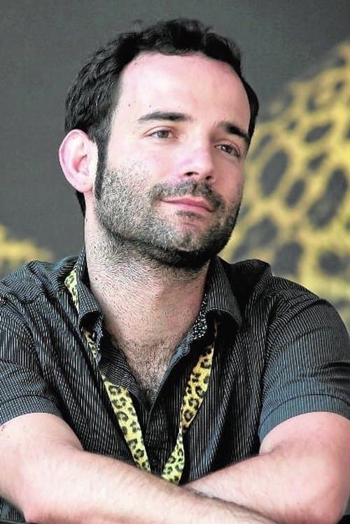 A portrait of Luis López Carrasco