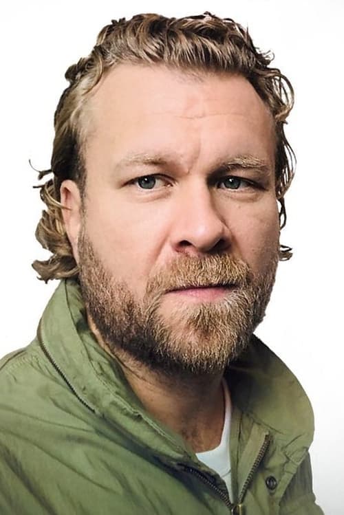 A portrait of Maciej Kawulski