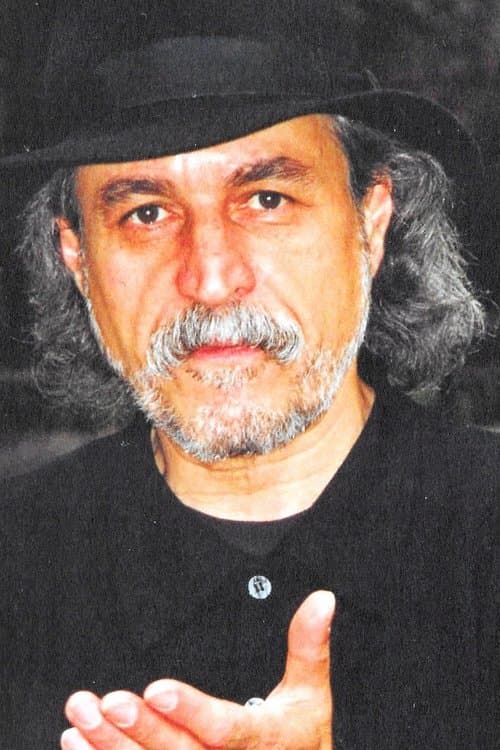 A portrait of Mansur Madavi