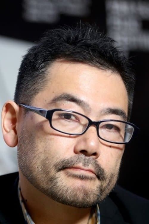 A portrait of Masaharu Take