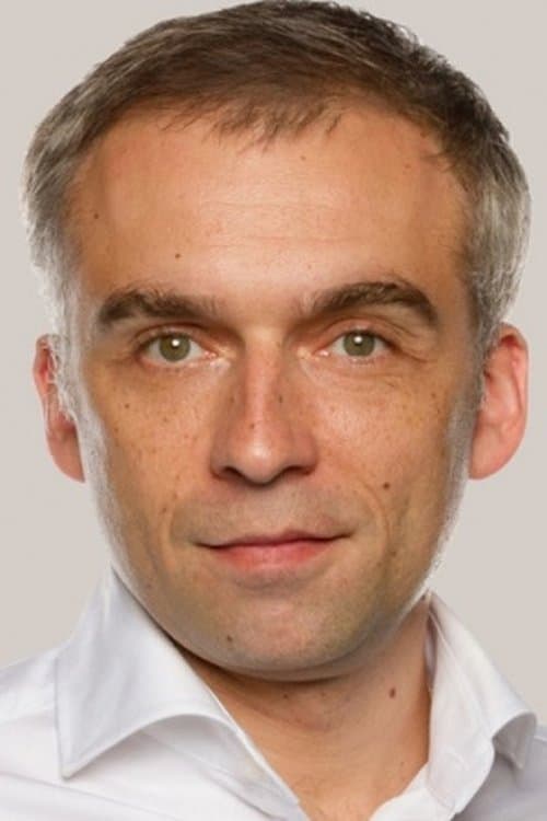 A portrait of Maxim Dashkin