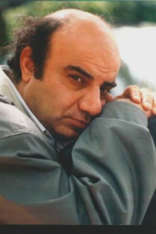 A portrait of Melih Gülgen