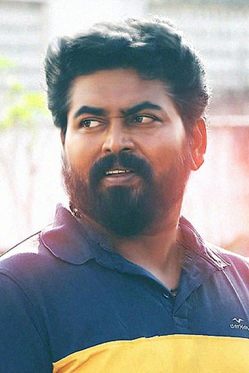A portrait of Micheal K.Raja