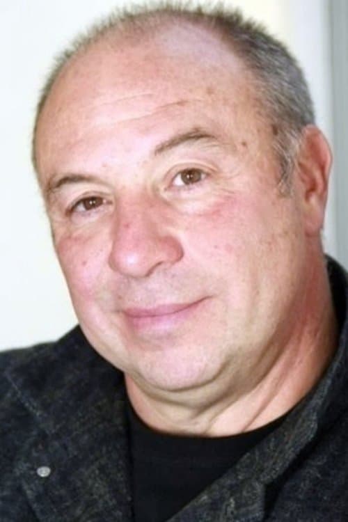 A portrait of Michel Delgado