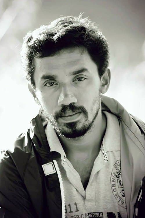 A portrait of Midhun Manuel Thomas