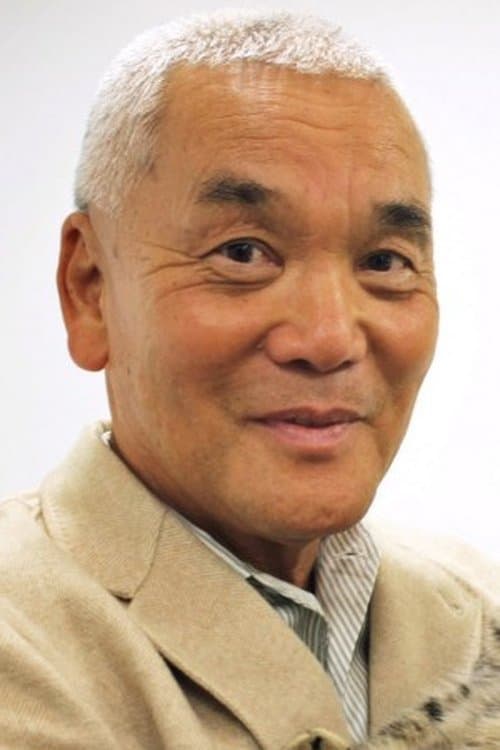 A portrait of Mitsuaki Iwago