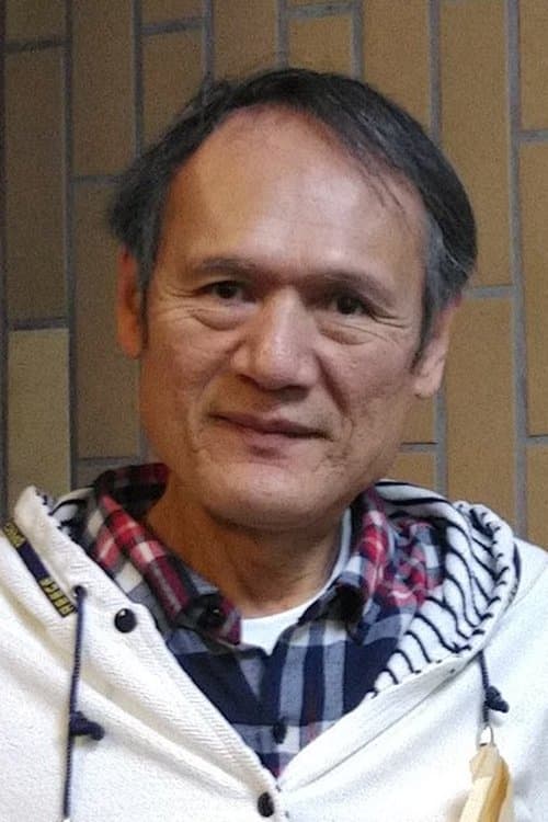 A portrait of Mototsugu Watanabe