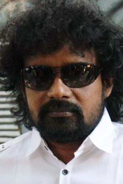 A portrait of Mu Kalanjiyam
