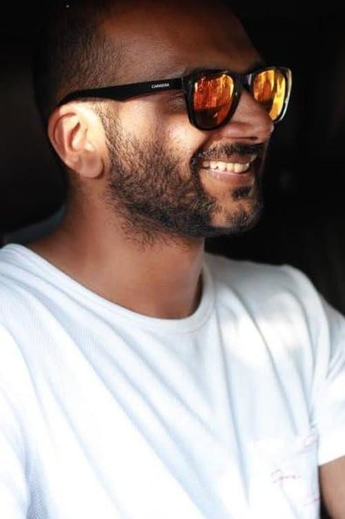 A portrait of Muhsin Parari