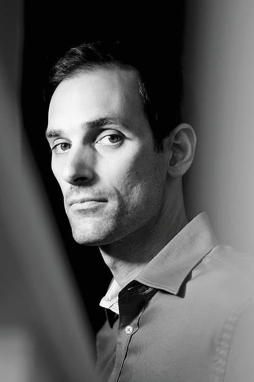 A portrait of Niles Atallah