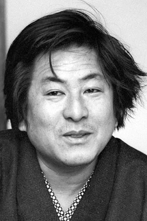A portrait of Norifumi Suzuki