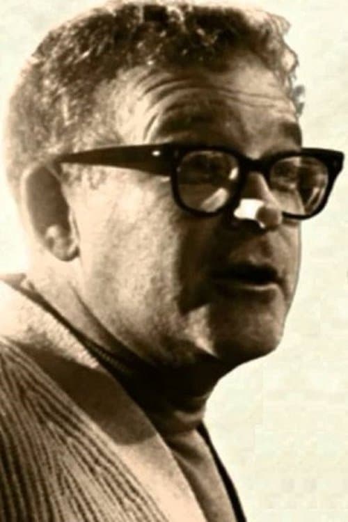 A portrait of Norman Tokar