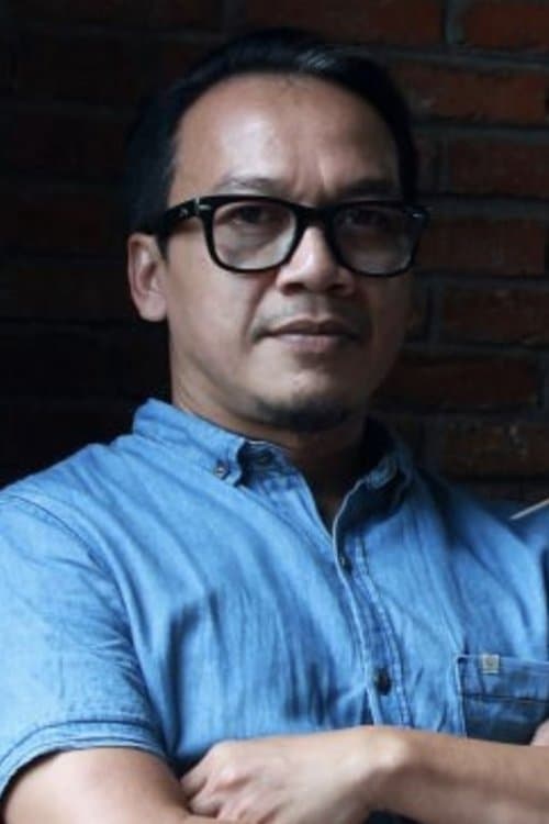 A portrait of Ody C. Harahap