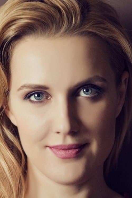 A portrait of Oksana Karas