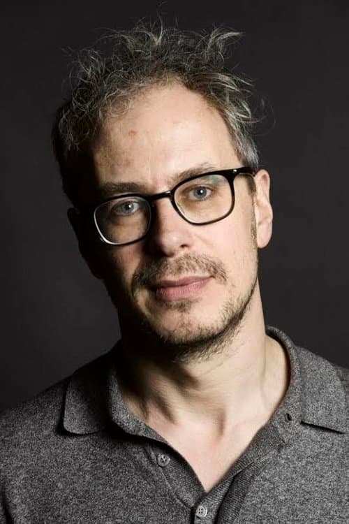 A portrait of Olly Lambert