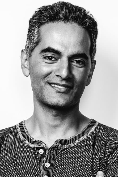 A portrait of Omar Mullick