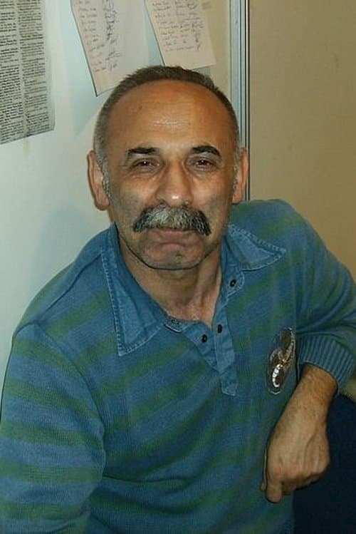 A portrait of Ömer Uğur
