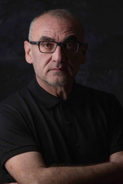 A portrait of Ömür Atay