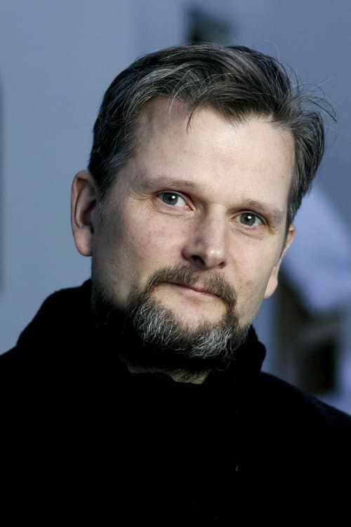 A portrait of Óskar Jónasson