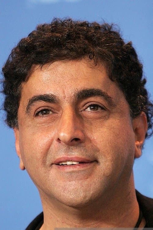 A portrait of Özer Kızıltan
