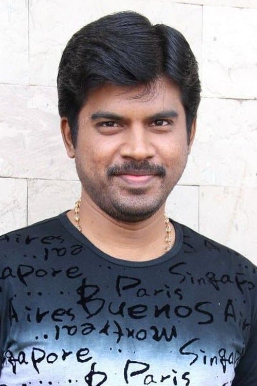 A portrait of Pa. Vijay