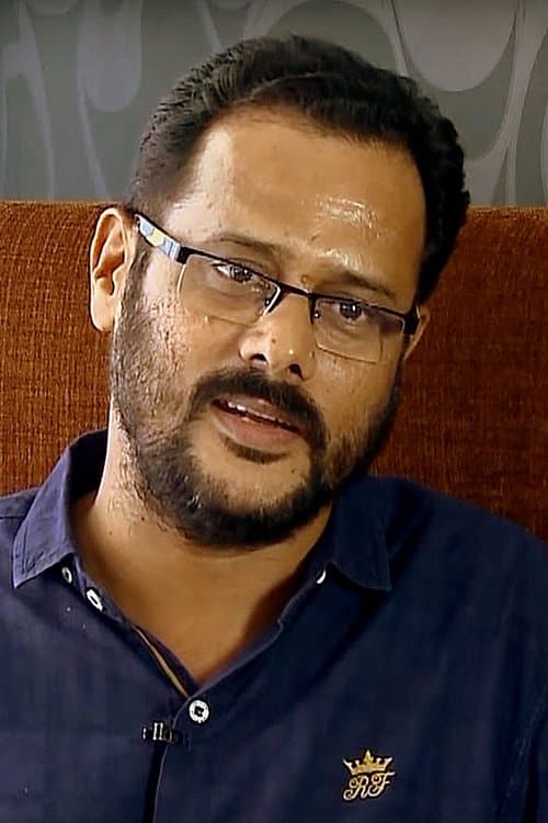 A portrait of Padmakumar M