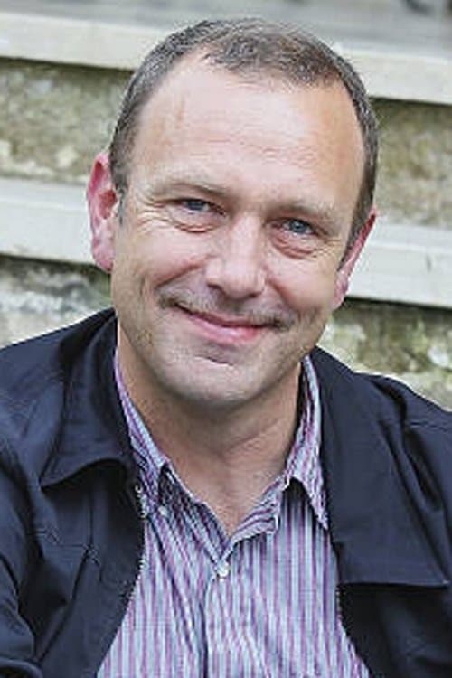 A portrait of Paul Cotter
