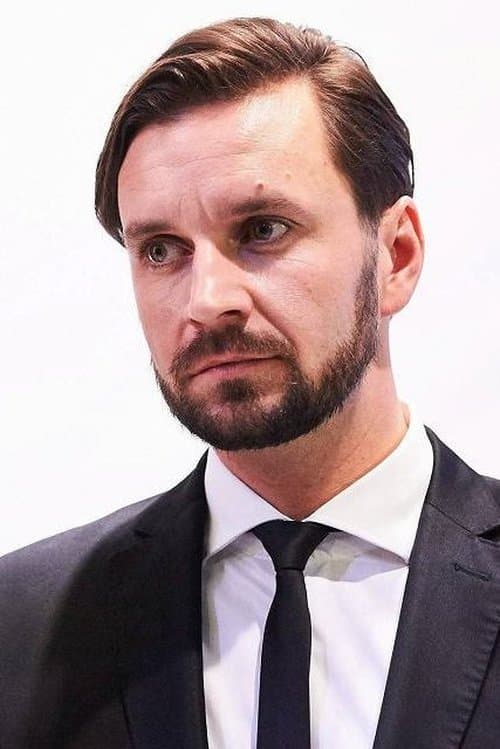 A portrait of Piotr Domalewski
