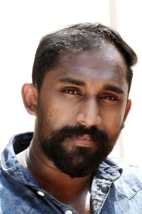A portrait of Praveen Murugan