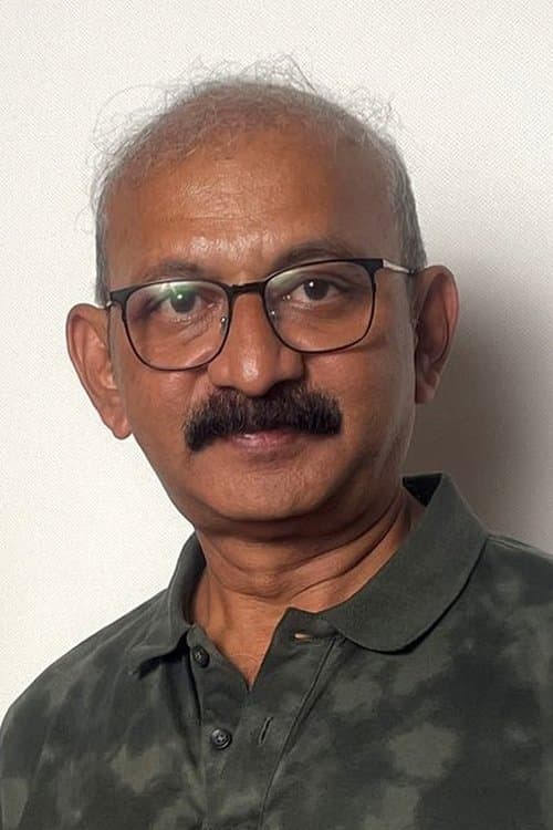 A portrait of Radha Mohan