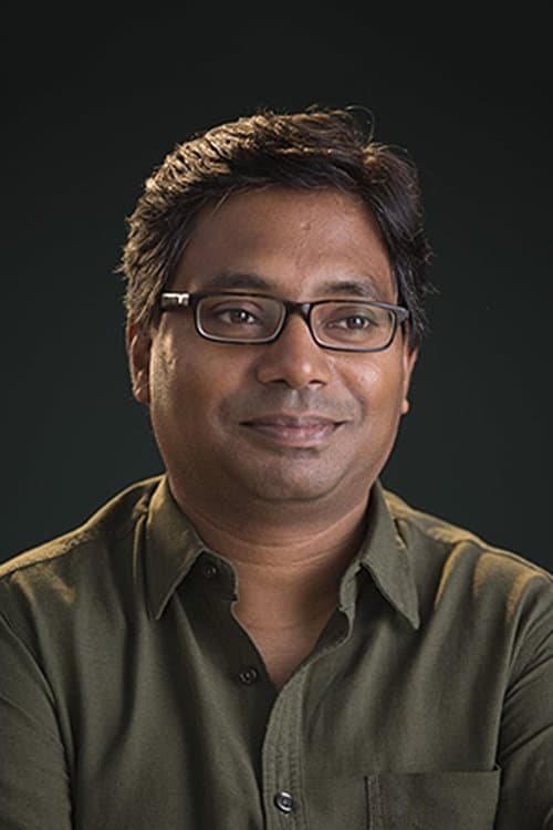 A portrait of Raj Kumar Gupta