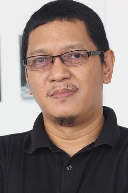 A portrait of Raymond Red