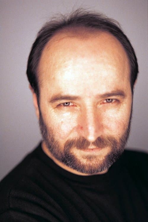 A portrait of Reis Çelik