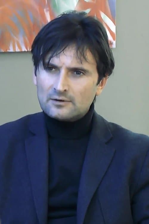 A portrait of Roger A. Fratter