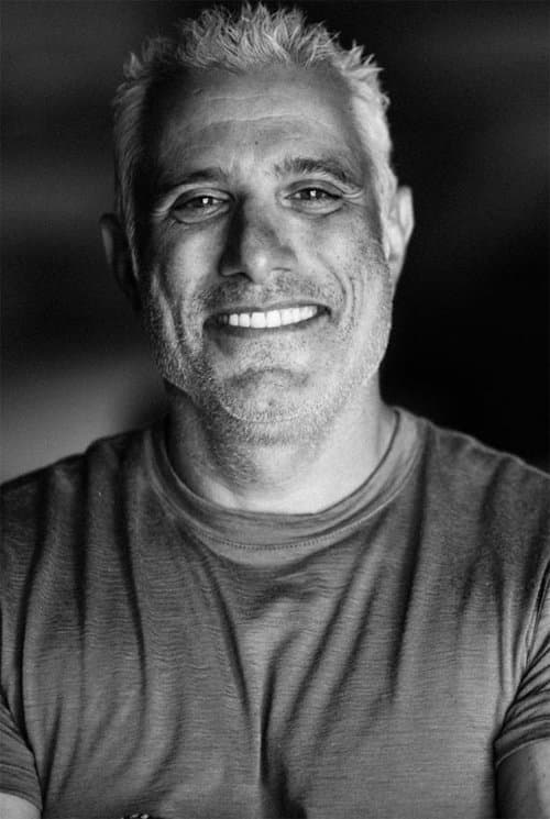 A portrait of Sandy Collora
