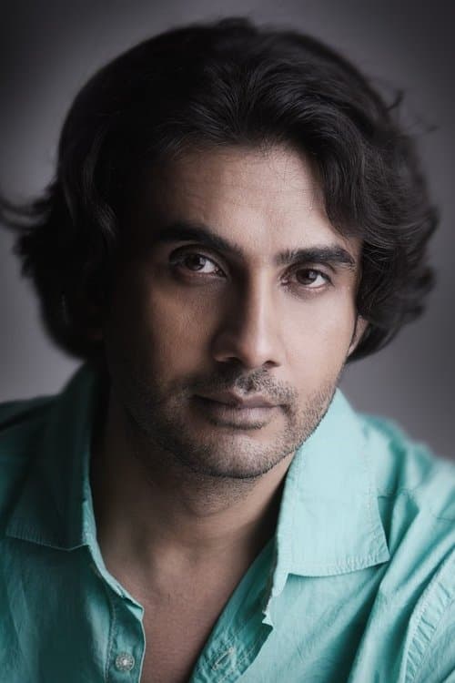 A portrait of Sanjay Puran Singh Chauhan