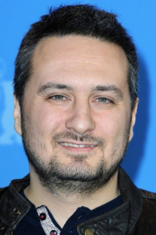 A portrait of Seyfi Teoman