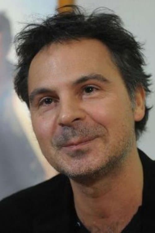 A portrait of Stéphan Archinard