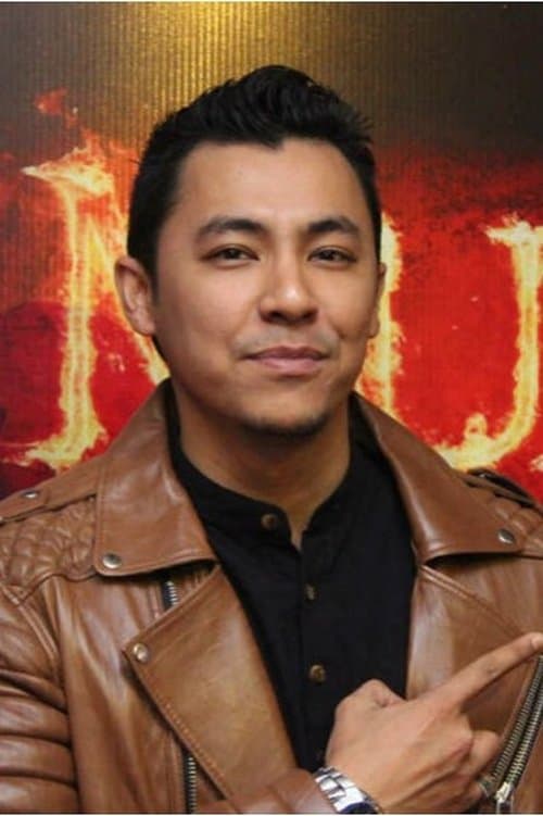 A portrait of Syamsul Yusof