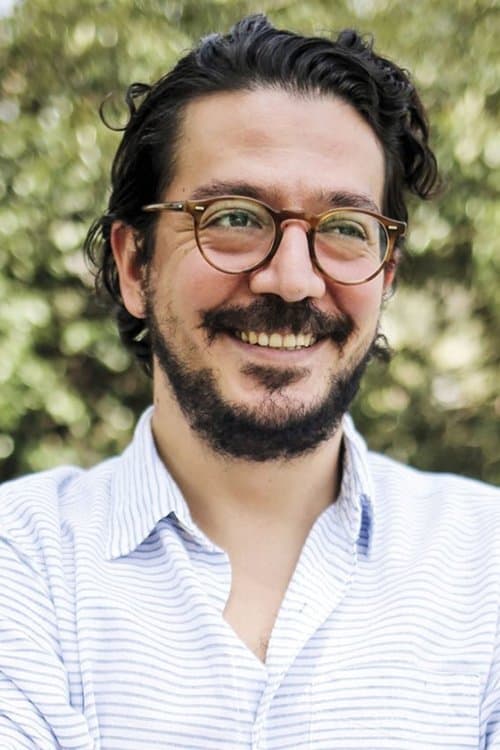 A portrait of Tolga Karaçelik