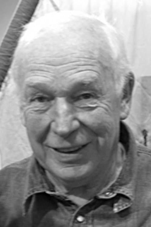A portrait of Tom Clegg